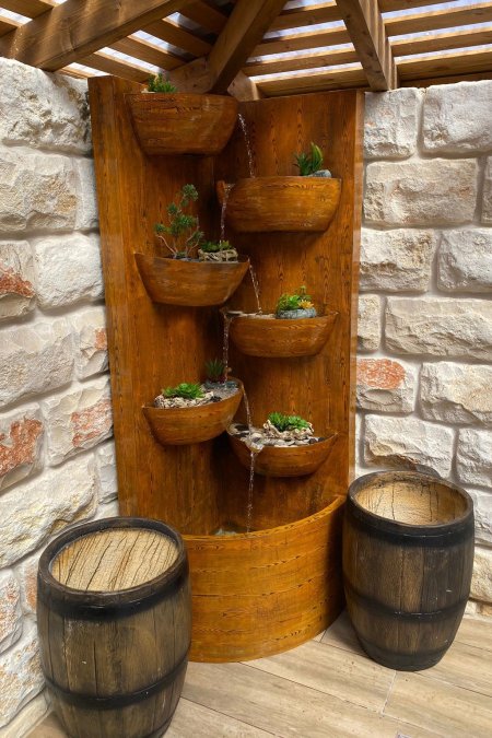 نافورة جدارية فيبر جلاس بتصميم خشبي فاخر