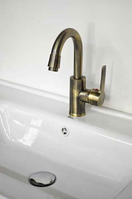 حنفية مغسلة ذهبي معتّق بتصميم دائري