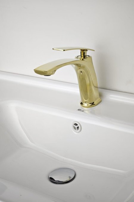 حنفية مغسلة ذهبية بتصميم انسيابي عصري