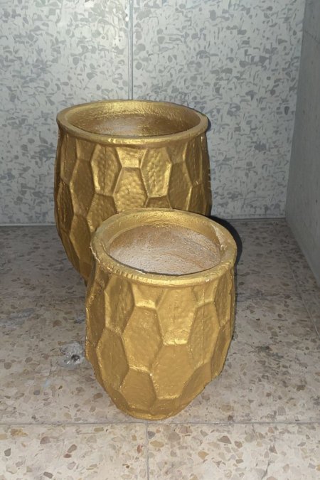 قوّارة هندسية بلون ذهبي فاخر