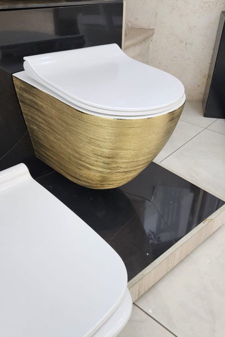 مرحاض تعليق فاخر – تشطيب ذهبي مطفي