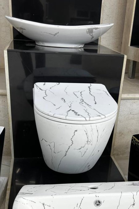 مرحاض تعليق – تصميم رخام أبيض